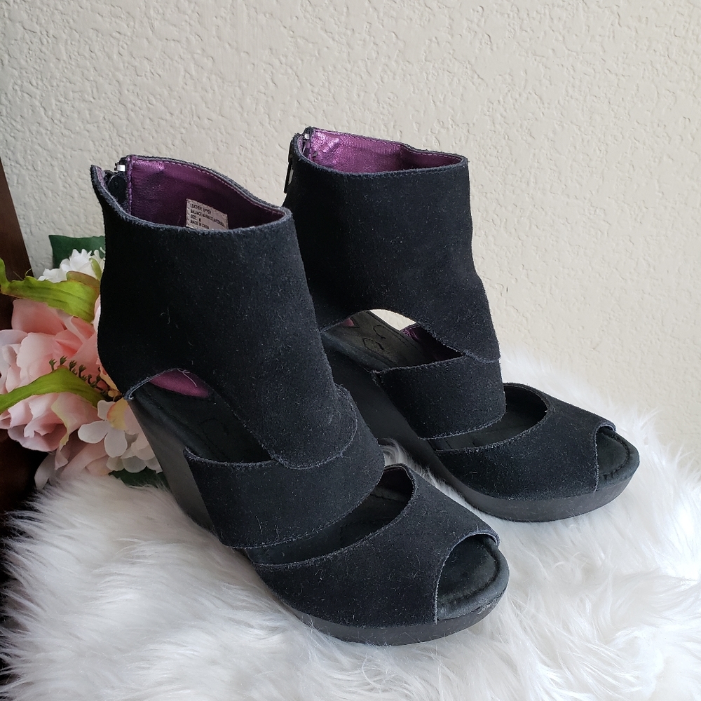 Volatile Leather Wedges